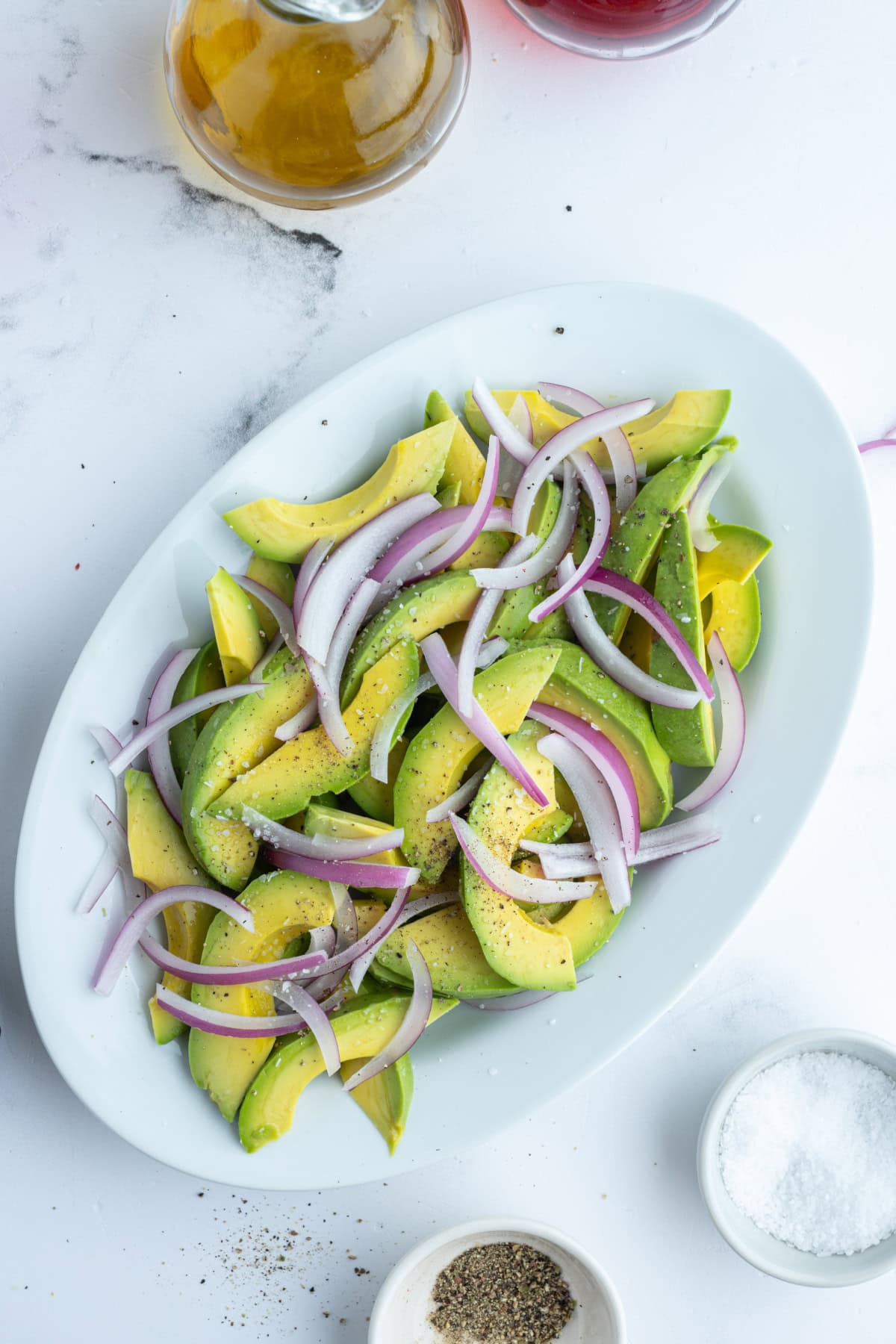 Avocado and Onion Salad recipe from RecipeGirl.com avocado and onion salad on oval platter