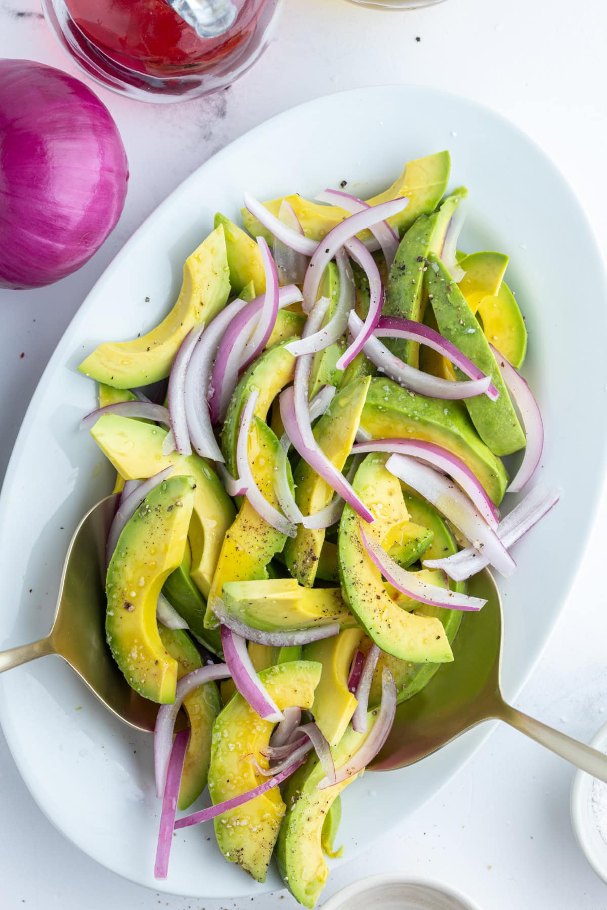 Avocado and Onion Salad recipe from RecipeGirl.com avocado and onion salad on oval platter