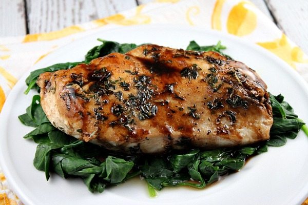 Balsamic Glazed Chicken recipe from RecipeGirl.com #easy #balsamic #glazed #chicken #recipe #RecipeGirl Balsamic Glazed Chicken with spinach on plate