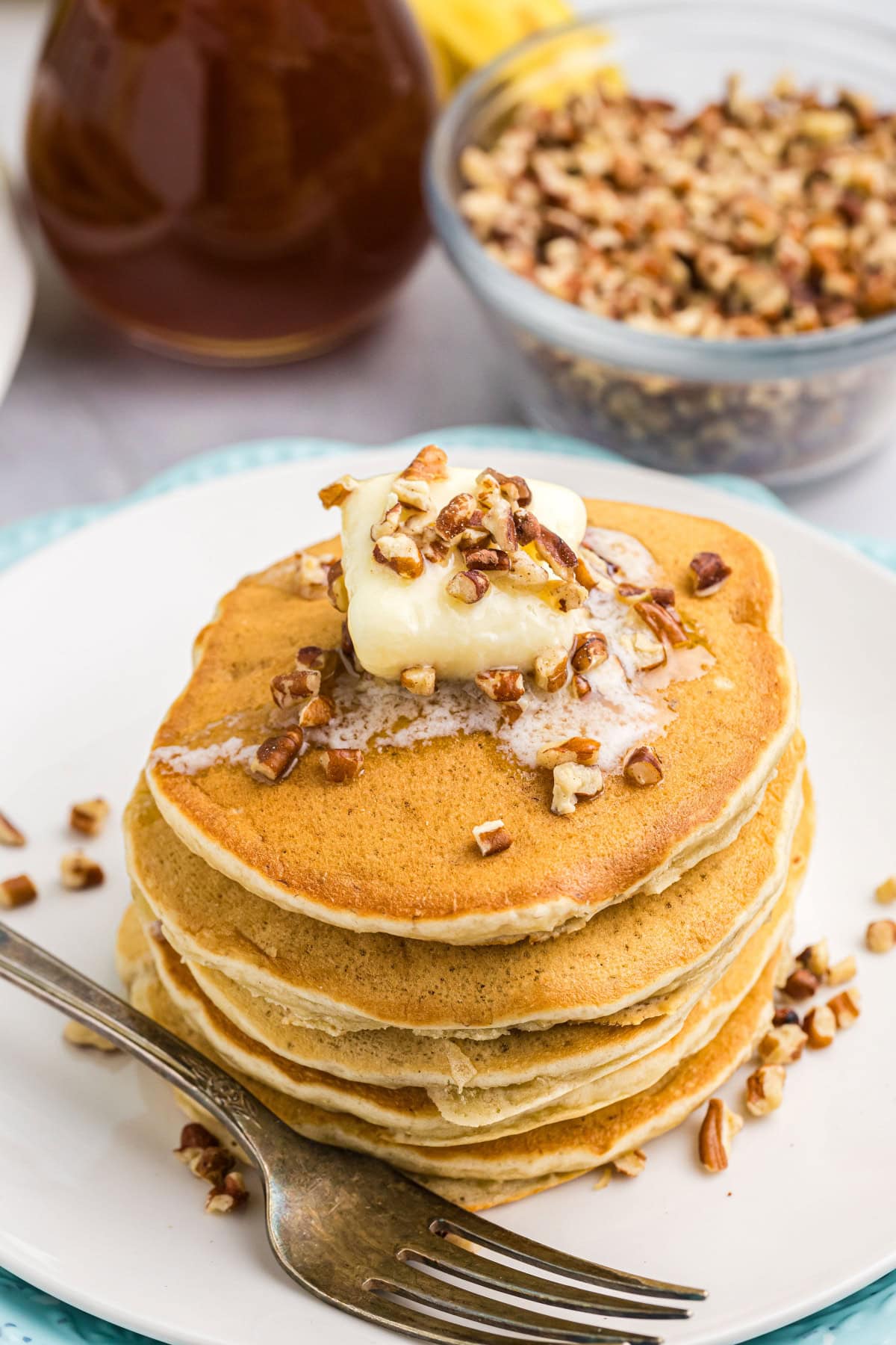 Banana Pecan Pancakes recipe from RecipeGirl.com // easy breakfast and brunch recipe stack of banana pecan pancakes
