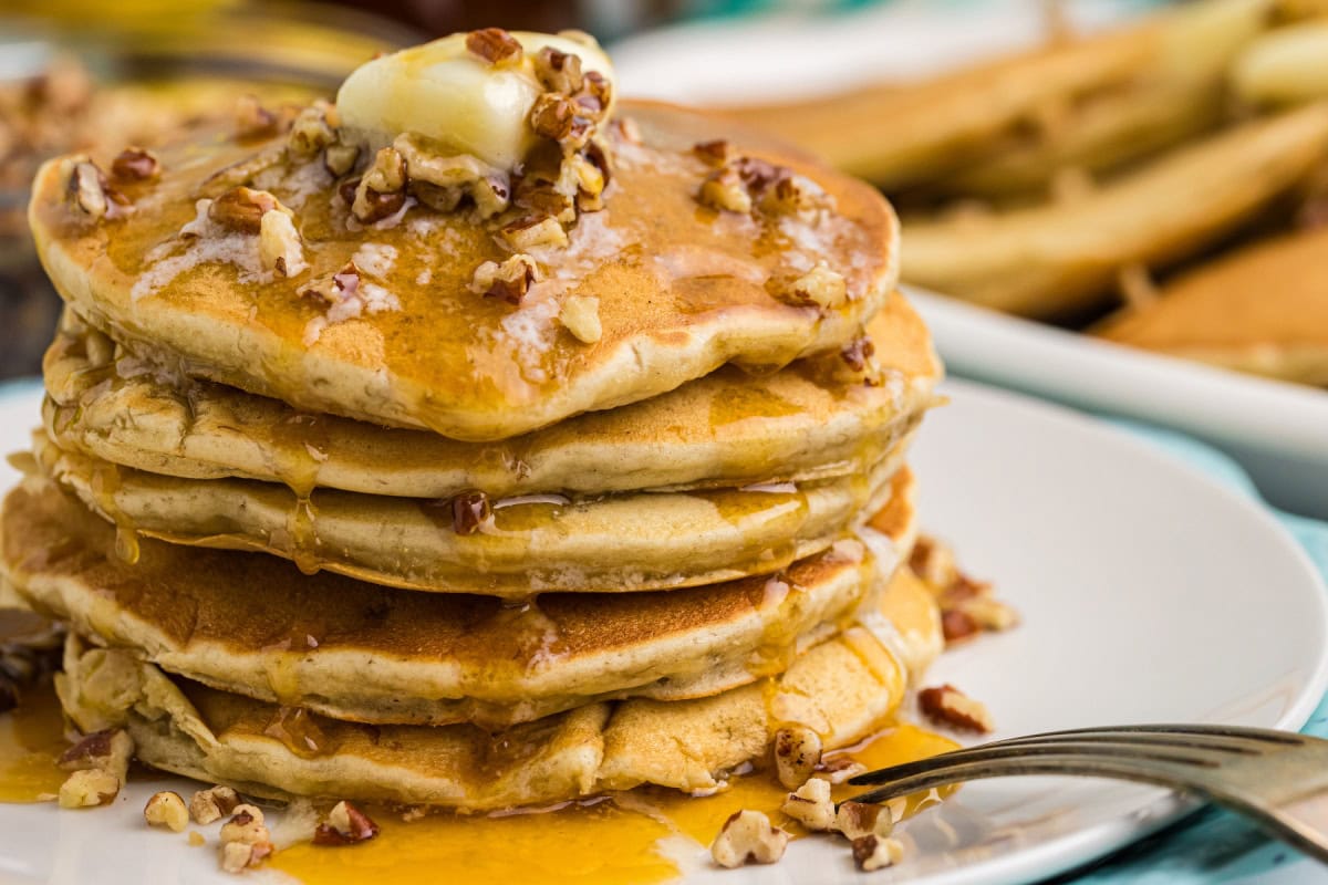 Banana Pecan Pancakes recipe from RecipeGirl.com // easy breakfast and brunch recipe stack of banana pecan pancakes