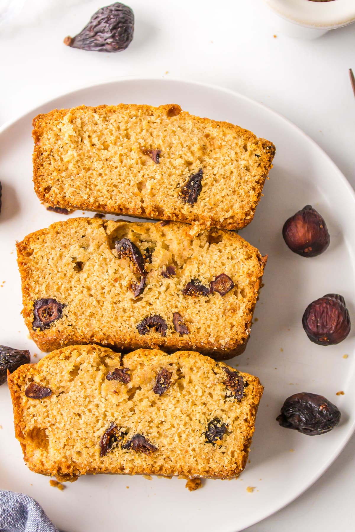 Caramel Fig Bread recipe from RecipeGirl.com three slices of caramel fig bread on a plate
