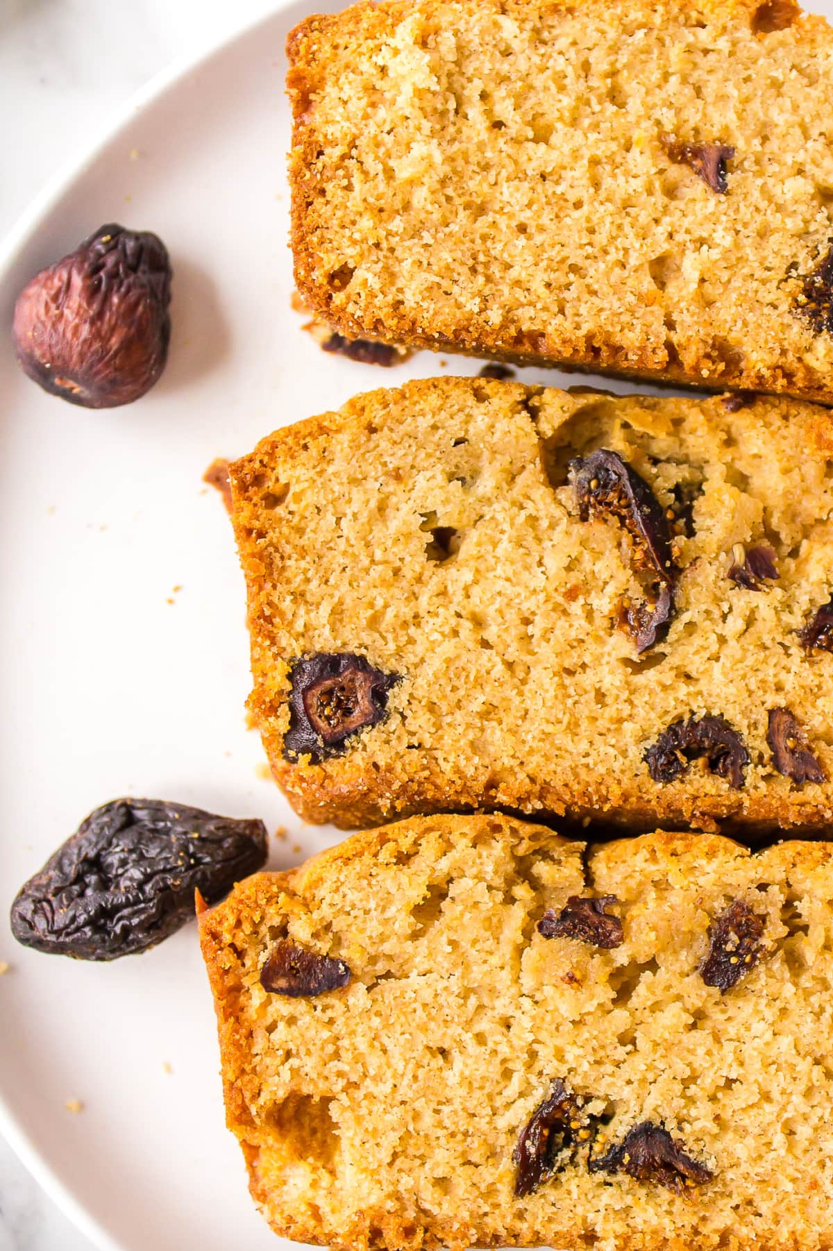 Caramel Fig Bread recipe from RecipeGirl.com three slices of caramel fig bread on a plate