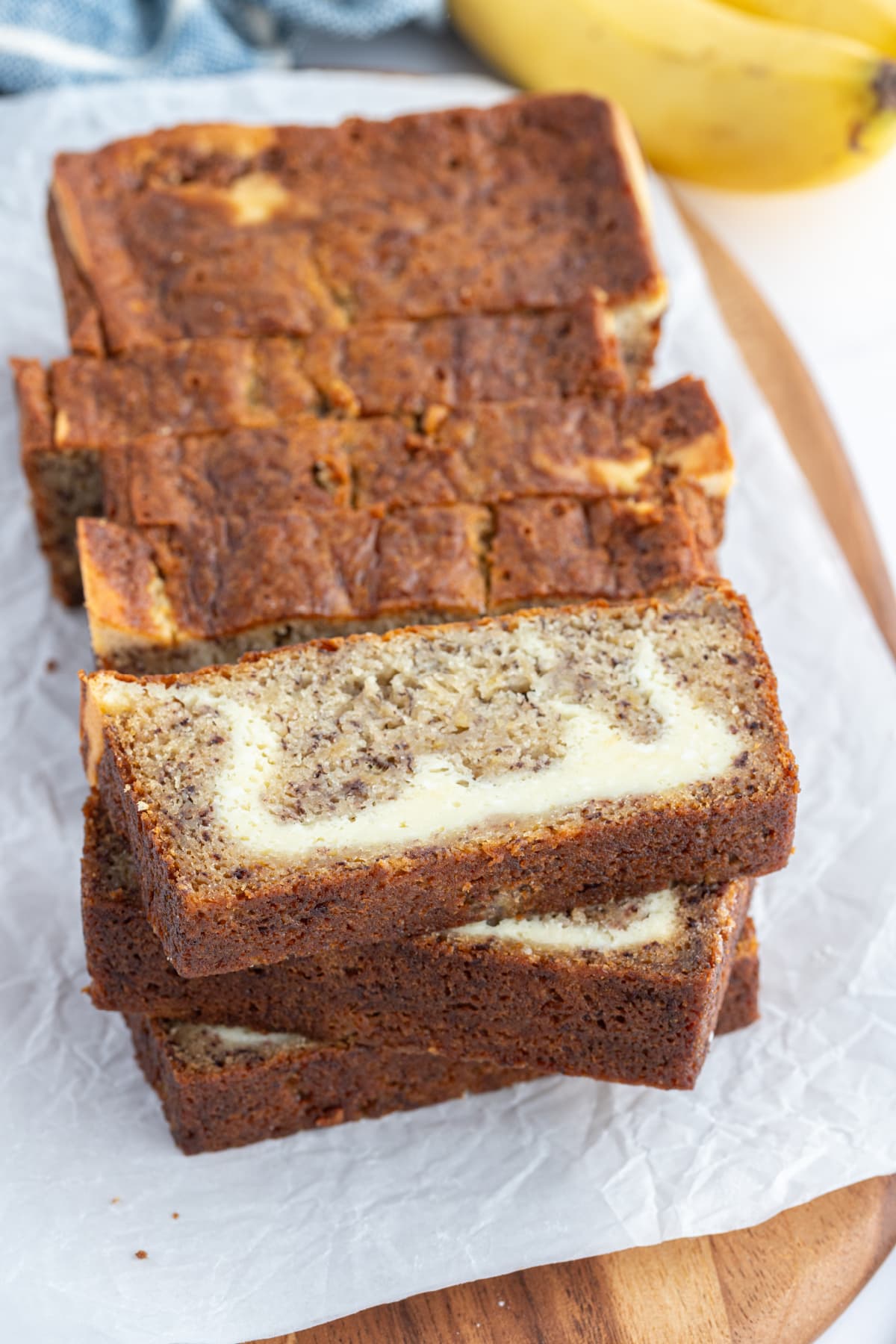 Cheesecake Banana Bread recipe from RecipeGirl.com slices of cheesecake banana bread stacked