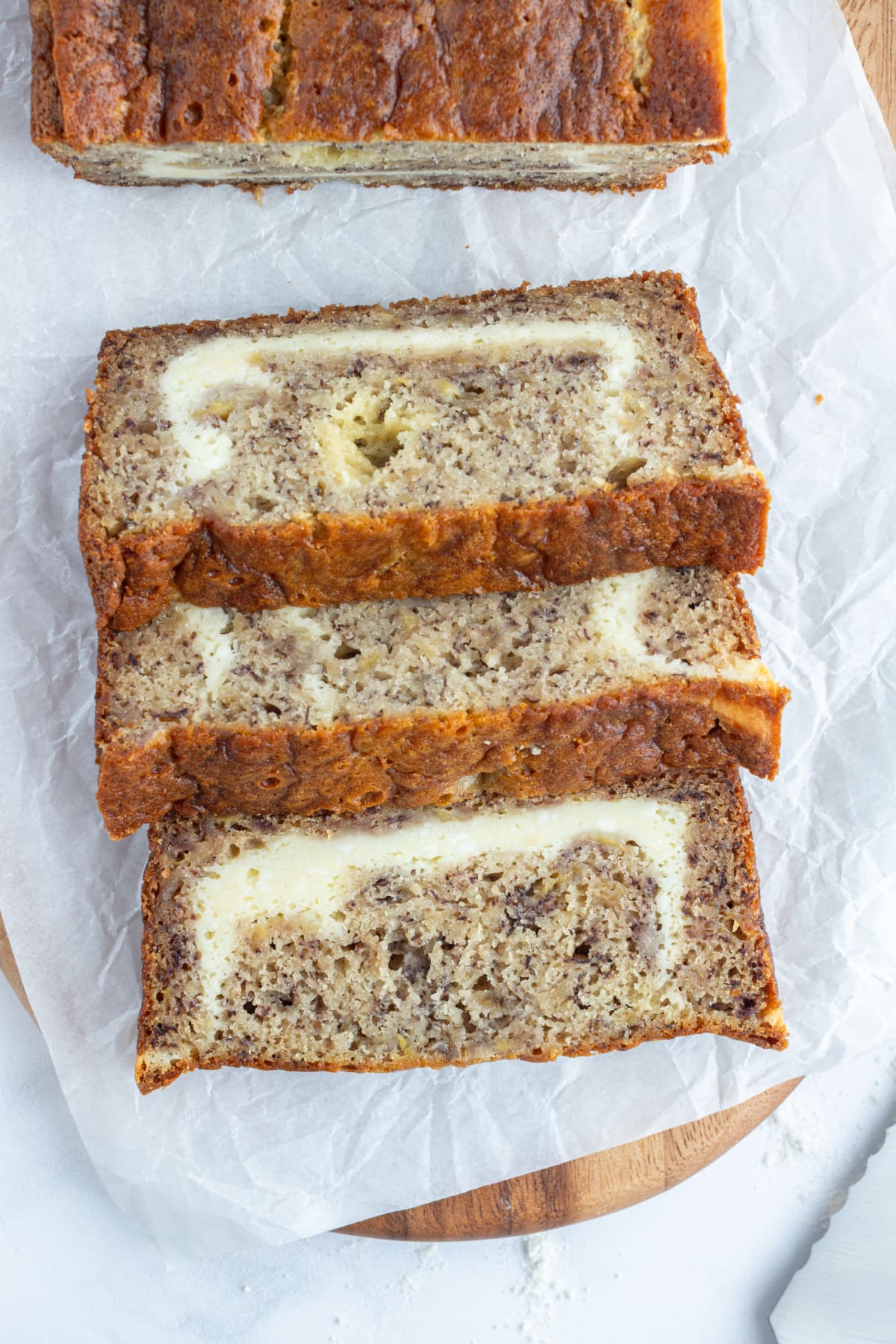 Cheesecake Banana Bread recipe from RecipeGirl.com three slices of cheesecake banana bread