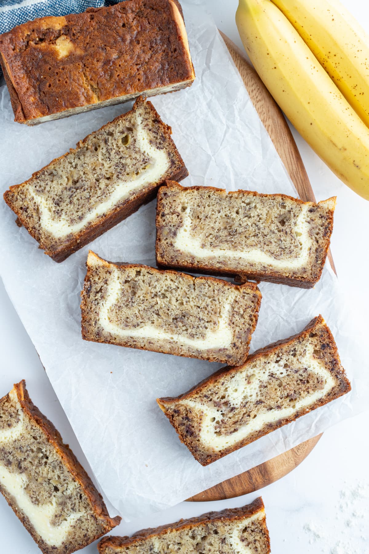 Cheesecake Banana Bread recipe from RecipeGirl.com slices of cheesecake banana bread