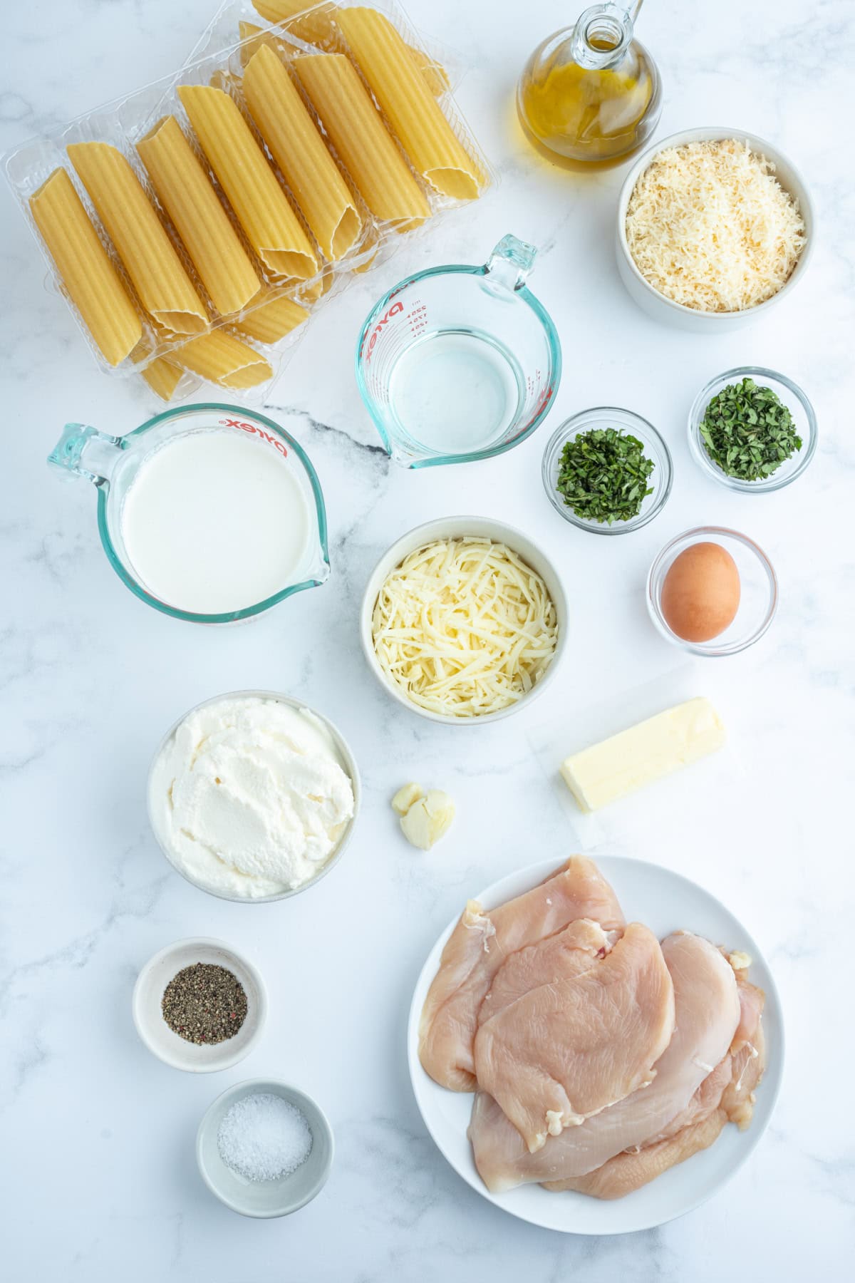Chicken Manicotti Alfredo recipe from RecipeGirl.com : best stuffed manicotti : chicken manicotti : cheese manicotti : cheesy pasta recipe! ingredients displayed for making chicken manicotti alfredo