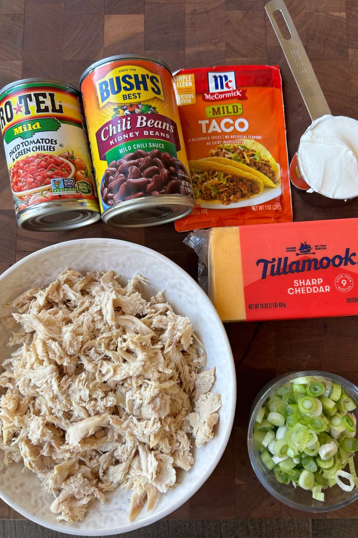 Slow Cooker Chicken Taco Dip recipe from RecipeGirl.com ingredients displayed for making slow cooker chicken taco dip