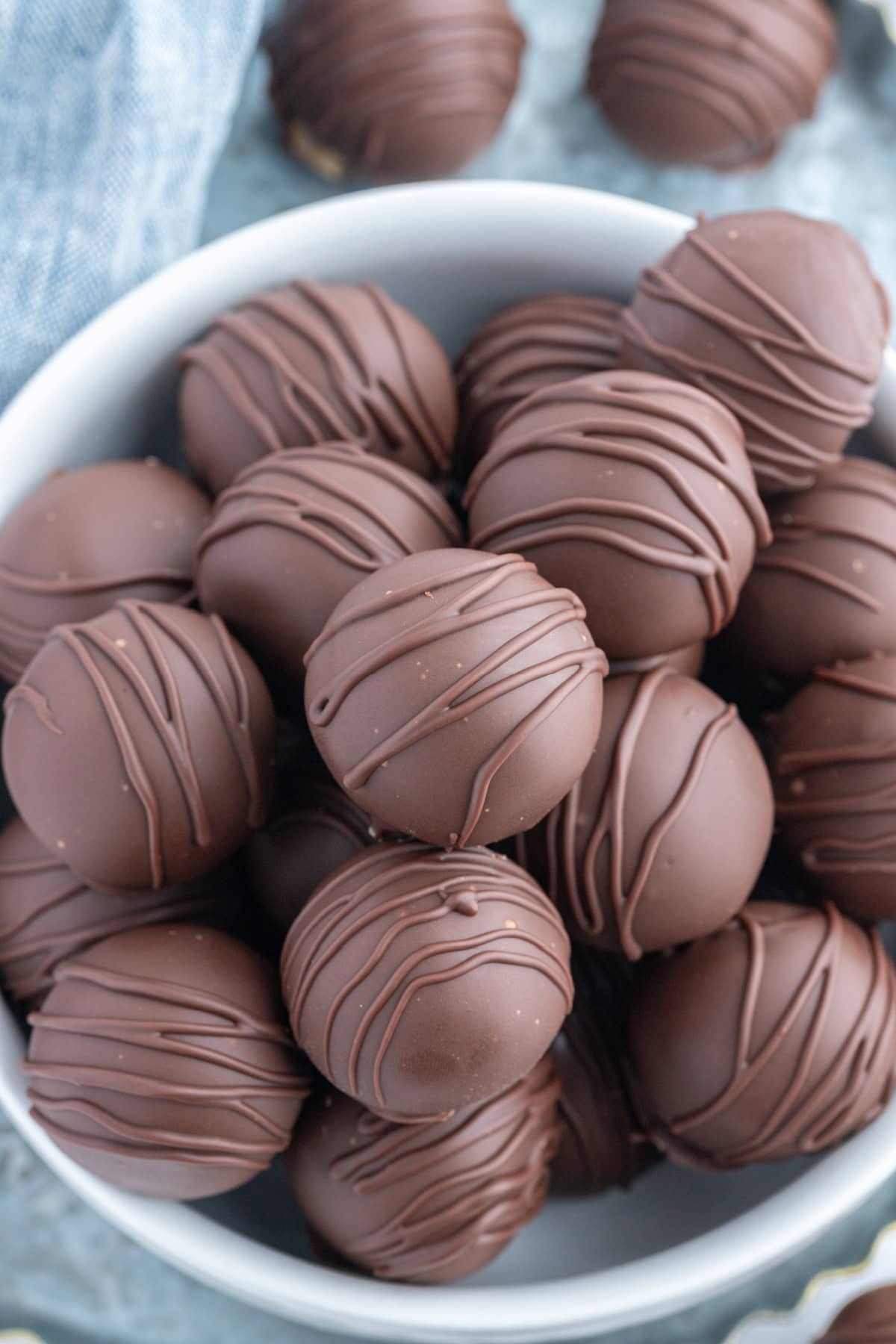 Chocolate Chip Cookie Dough Truffles recipe from RecipeGirl.com flour safe to eat : chocolate covered chocolate chip cookie dough lovers bowl of chocolate chip cookie dough truffles