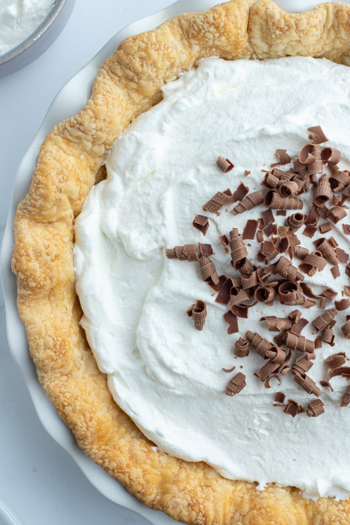Totally delicious classic easy Chocolate Cream Pie recipe from RecipeGirl.com close up chocolate cream pie