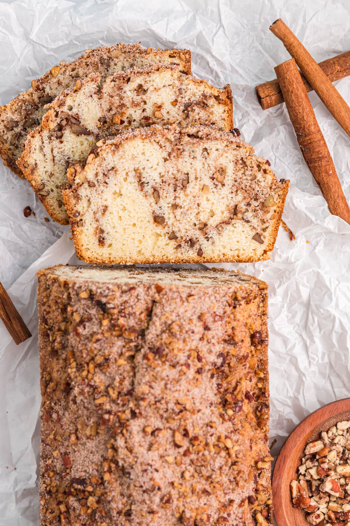 Cinnamon Pecan Bread recipe from RecipeGirl.com overhead shot of cinnamon pecan bread with some sliced