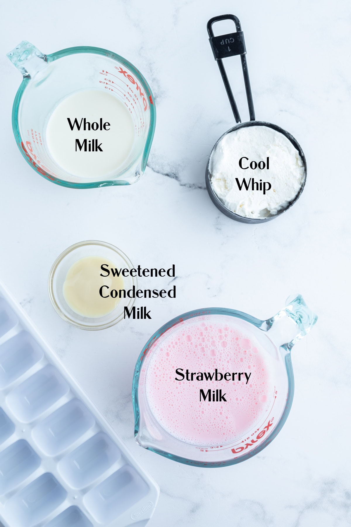 Copycat Wendy's Strawberry Frosty recipe from RecipeGirl.com ingredients displayed for making copycat wendy's strawberry frosty