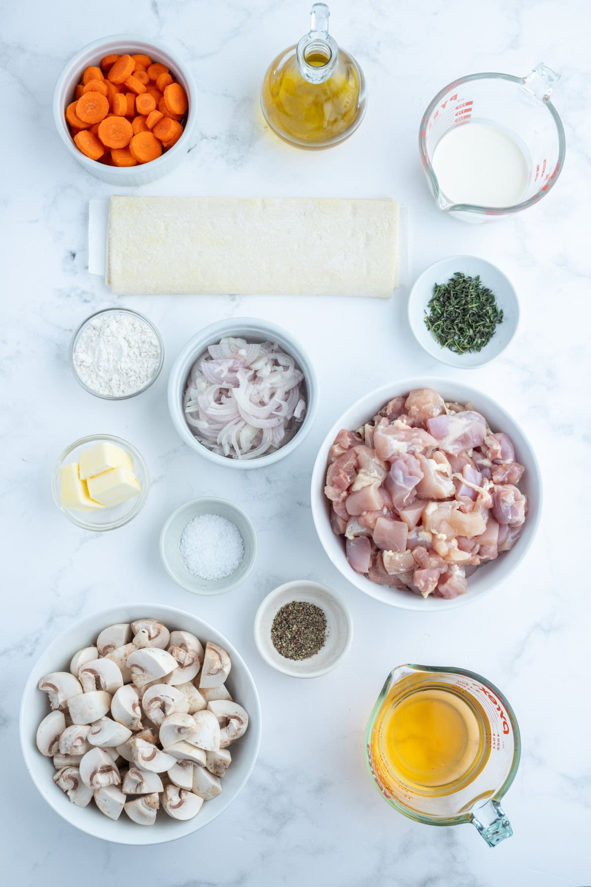 Coq au Vin Pot Pie recipe from RecipeGirl.com : Fun way to eat this popular French comfort food recipe, and a unique version of the classic chicken pot pie. ingredients displayed for making coq au vin pot pie
