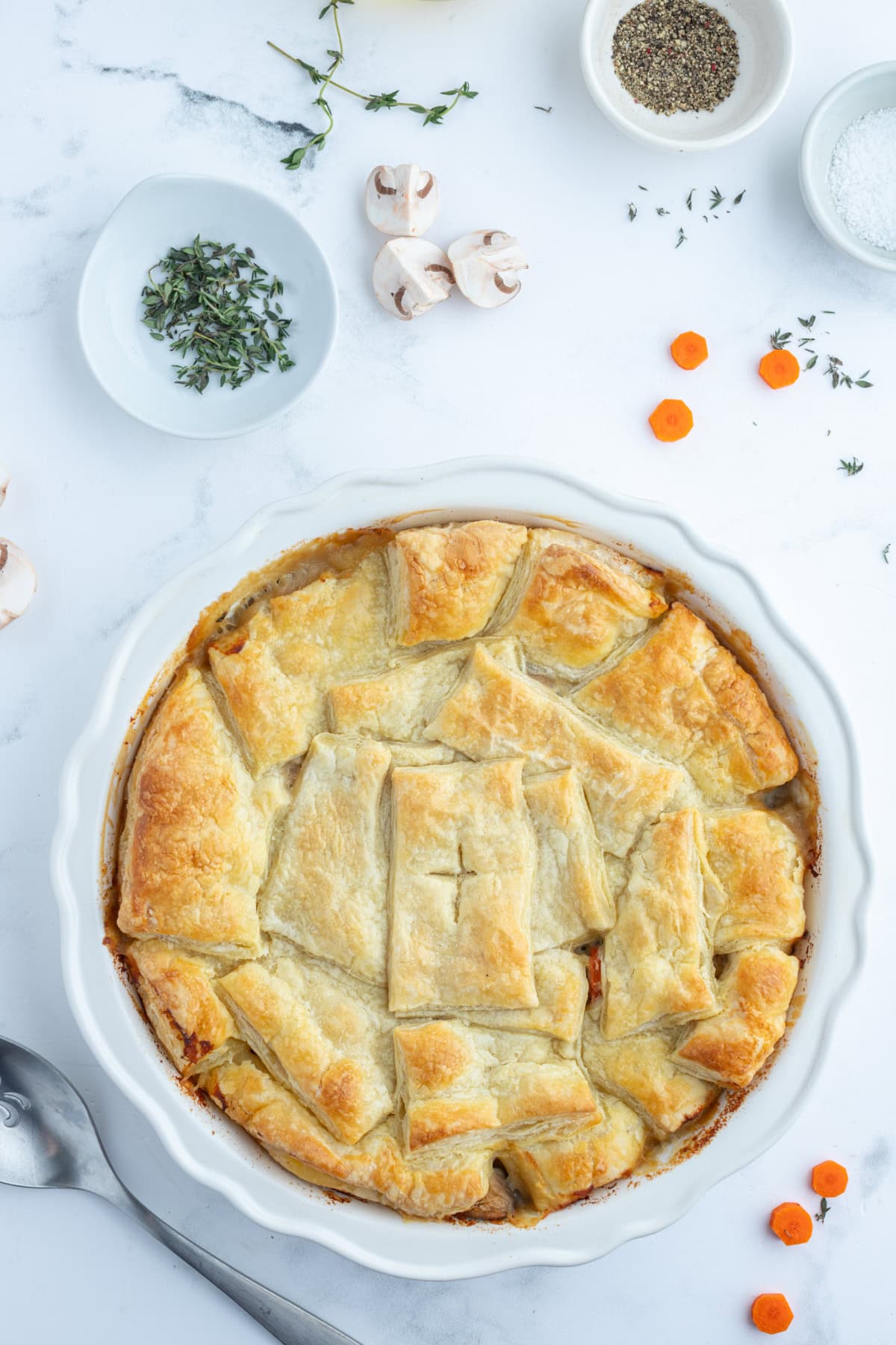 Coq au Vin Pot Pie recipe from RecipeGirl.com : Fun way to eat this popular French comfort food recipe, and a unique version of the classic chicken pot pie. whole coq au vin pot pie
