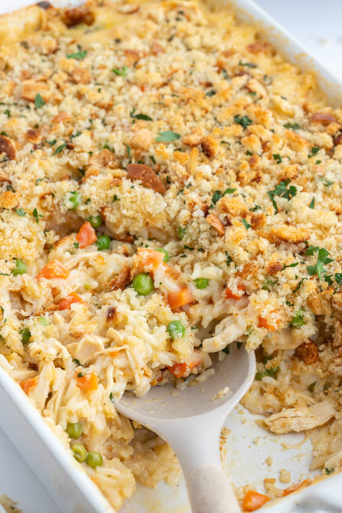 Creamy Chicken and Rice Casserole recipe from RecipeGirl.com : Easy family friendly casserole recipe casserole dish full of creamy chicken and rice casserole
