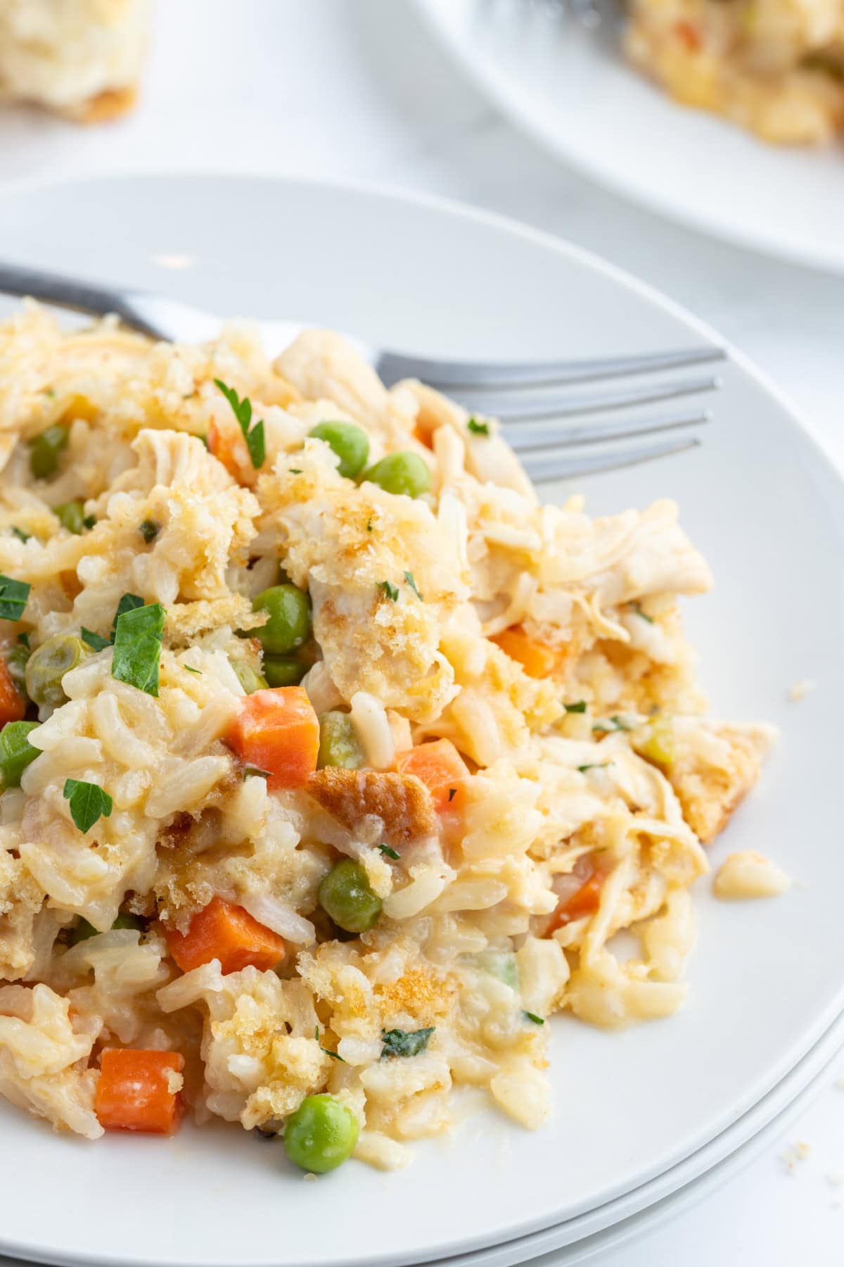 Creamy Chicken and Rice Casserole recipe from RecipeGirl.com : Easy family friendly casserole recipe plate of creamy chicken and rice casserole