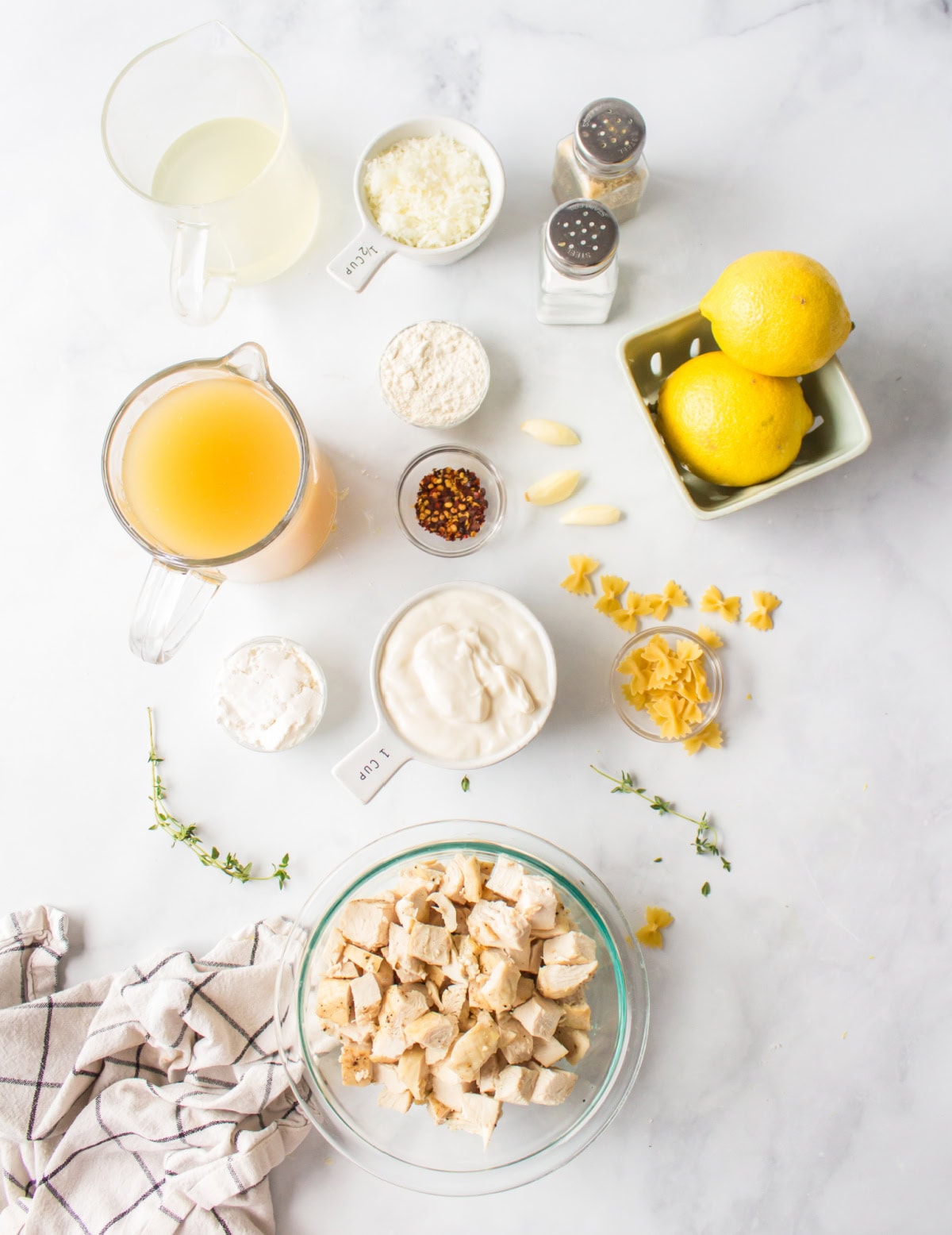 Creamy Lemon Chicken Pasta recipe from RecipeGirl.com ingredients displayed for making creamy lemon chicken pasta