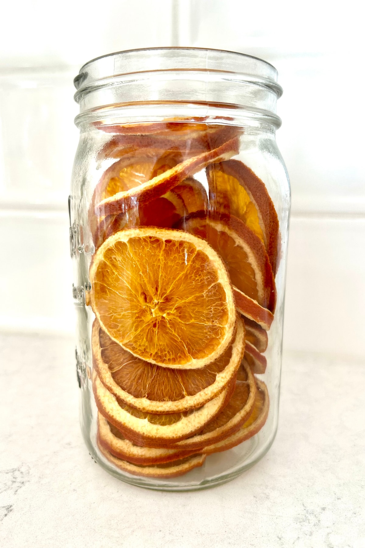 Dehydrated Orange Slices recipe from RecipeGirl.com jar of dehydrated oranges