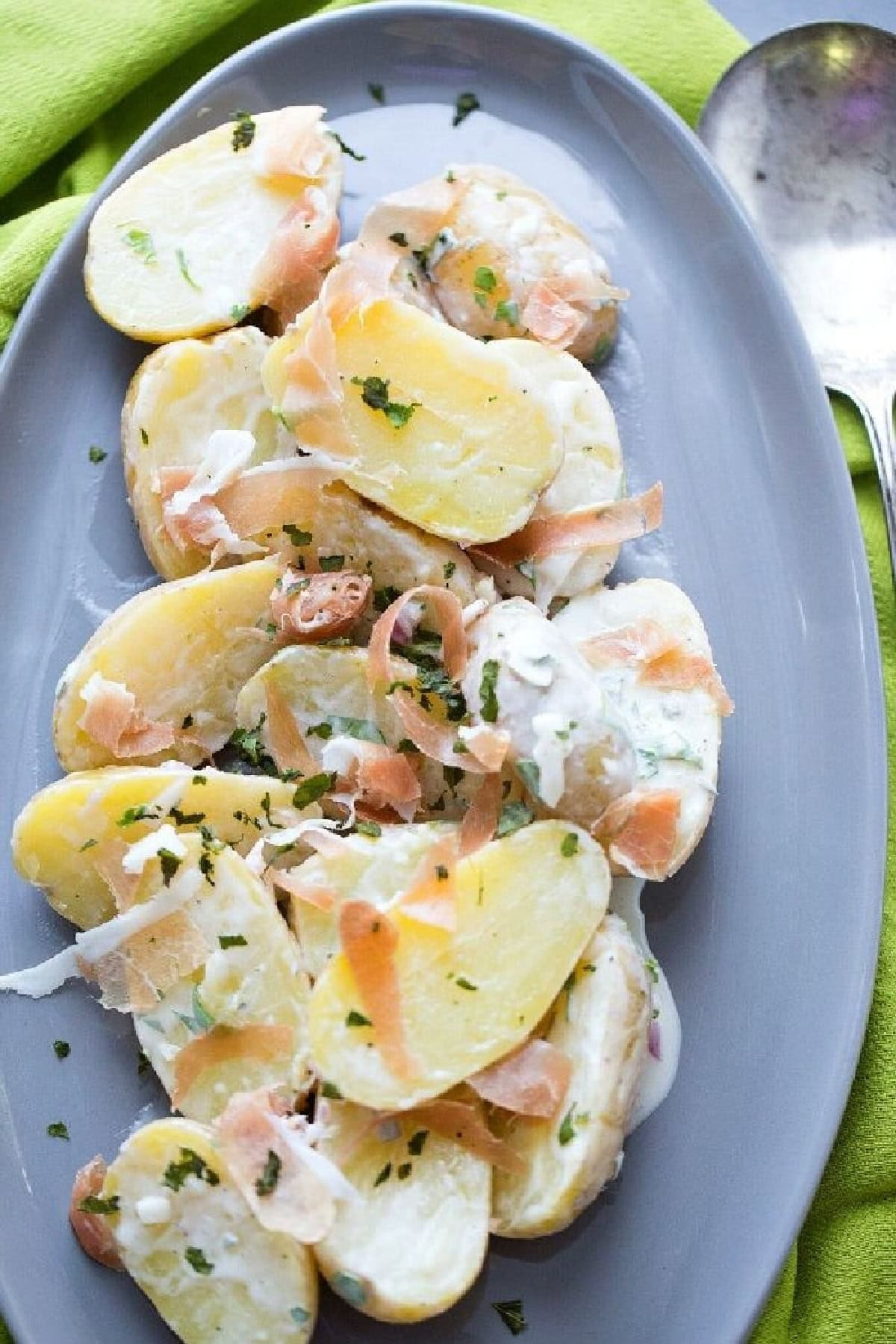 21 Favorite Potato Salad Recipes collection on RecipeGirl.com plate of fingerling potato and prosciutto salad