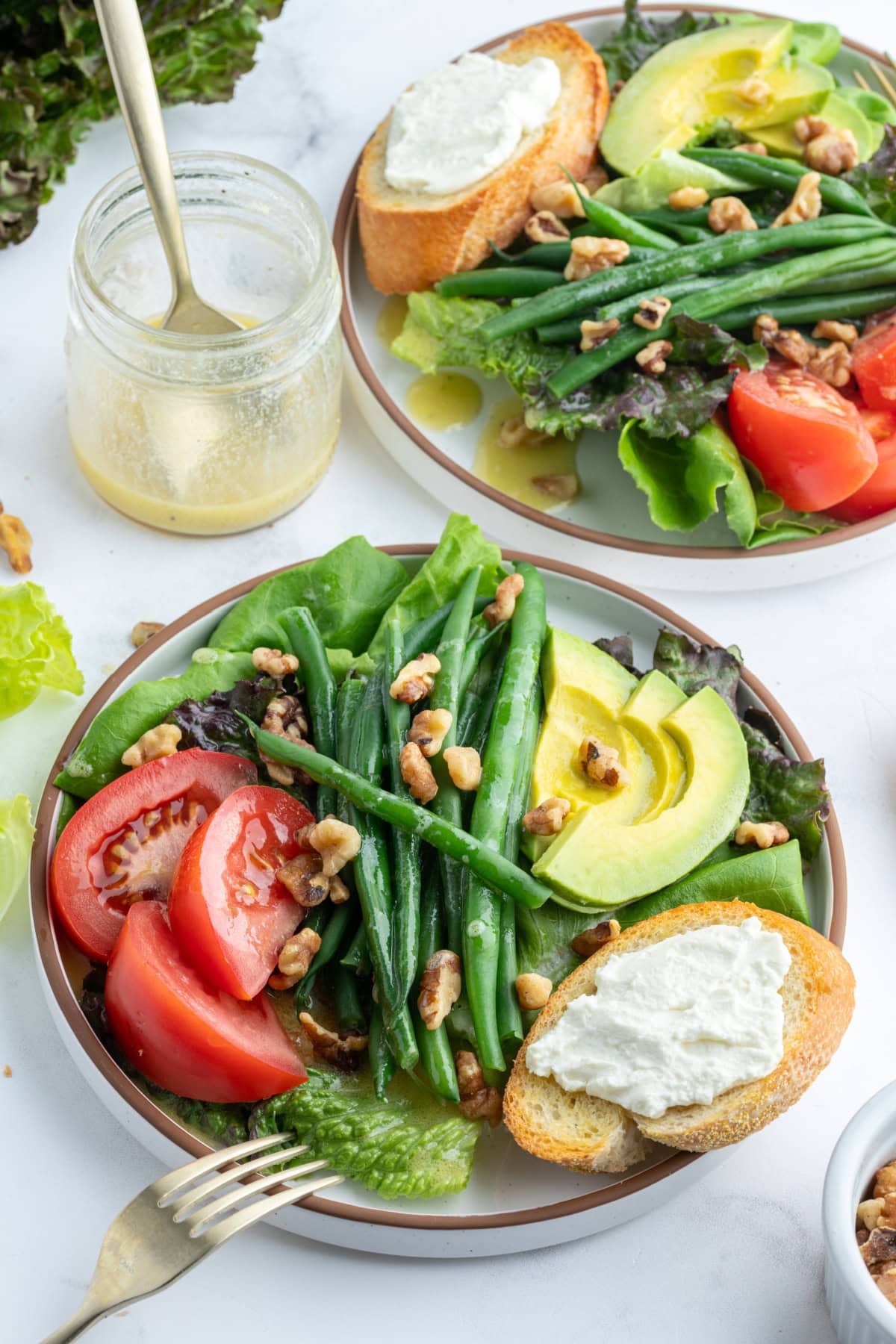 French Goat Cheese Salad recipe from RecipeGirl.com french goat cheese salad on two plates