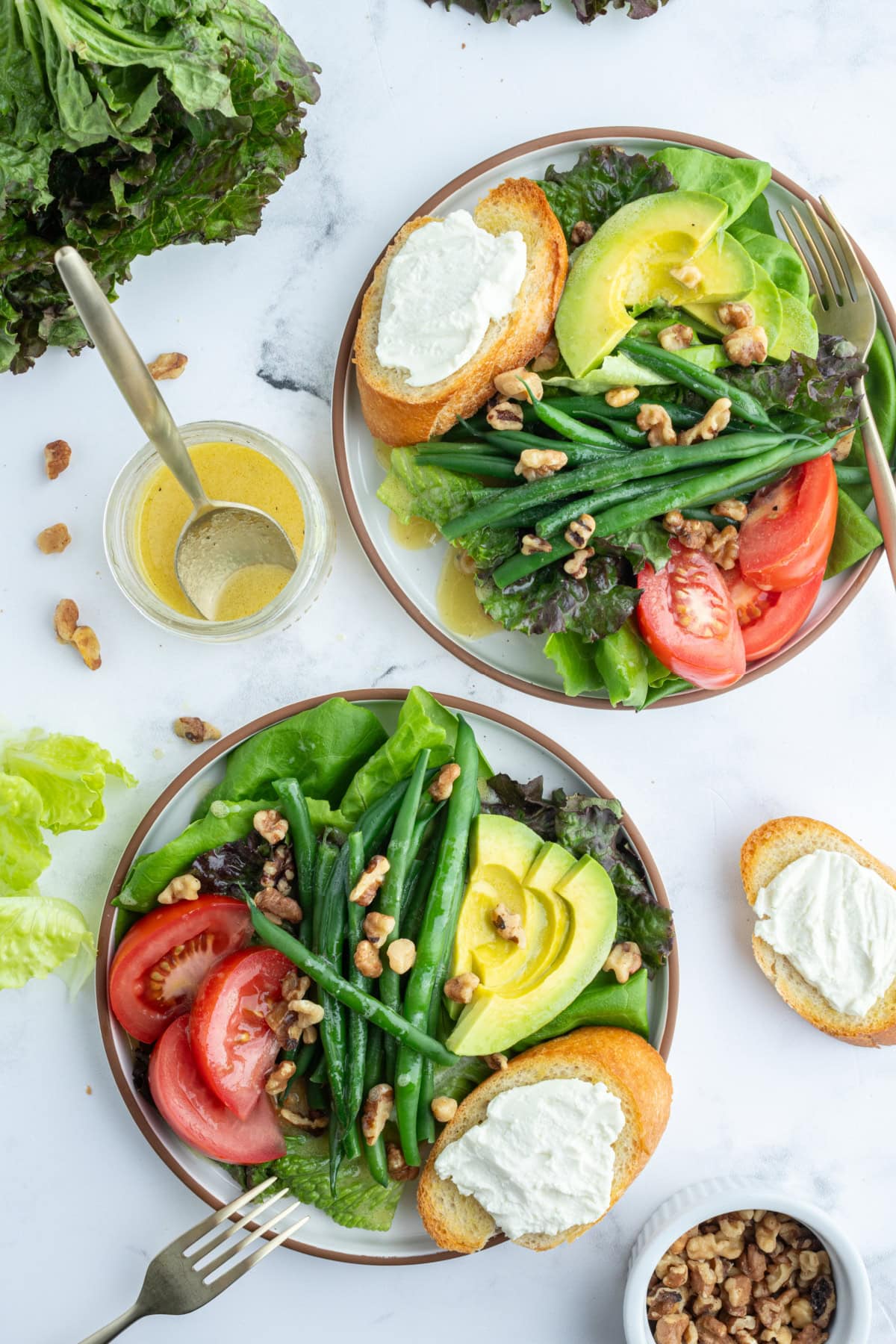 French Goat Cheese Salad recipe from RecipeGirl.com two servings of french goat cheese salad