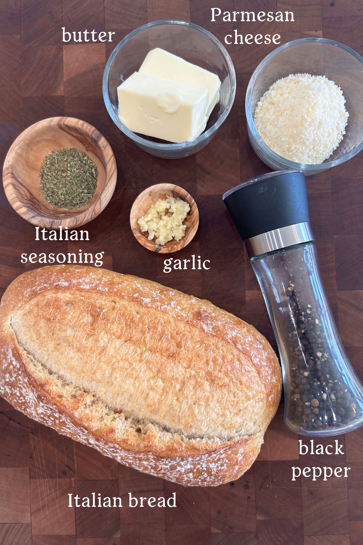 Garlic Bread Spread recipe from RecipeGirl.com ingredients displayed for making garlic bread spread