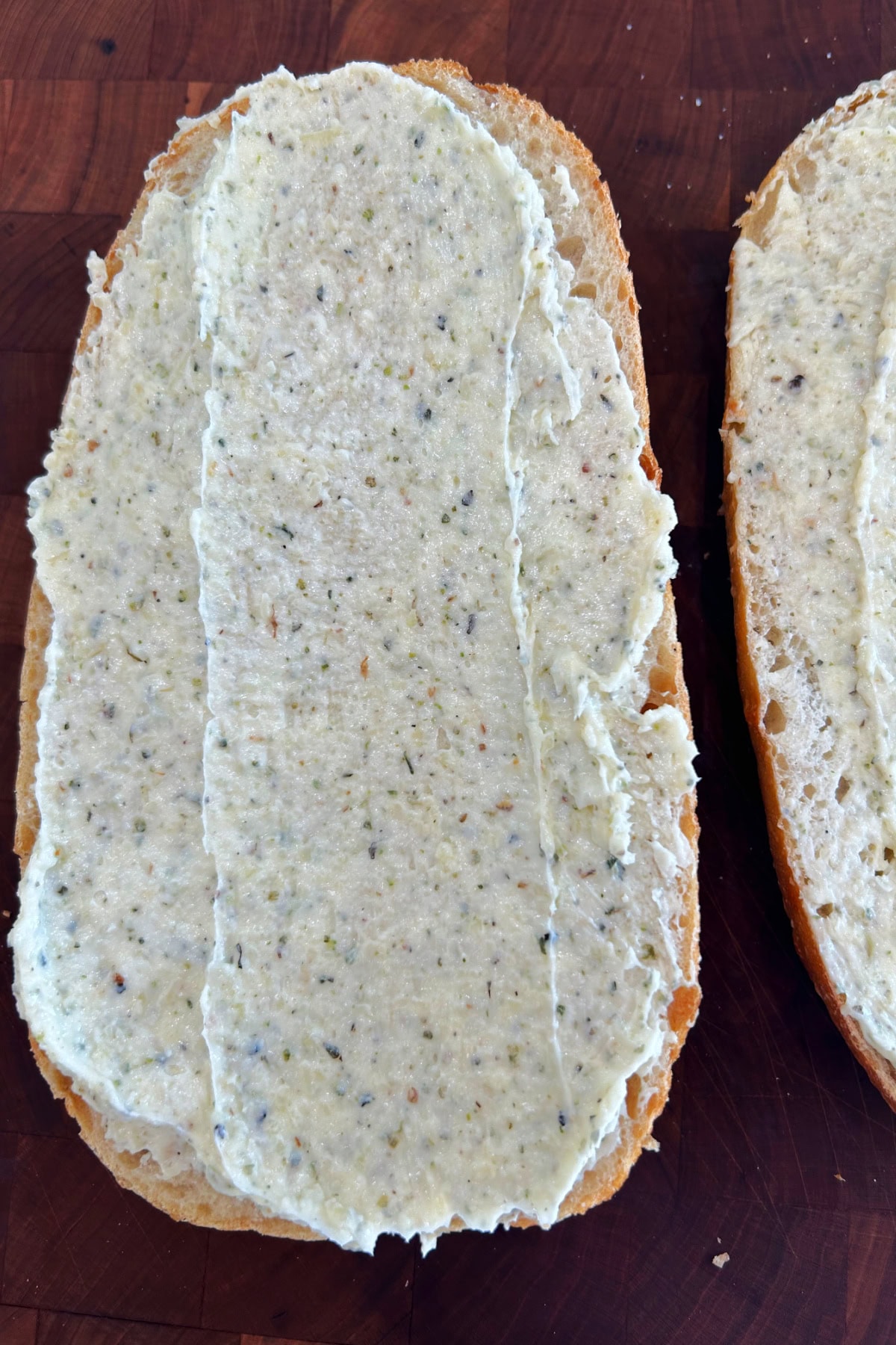 Garlic Bread Spread recipe from RecipeGirl.com garlic bread spread on bread
