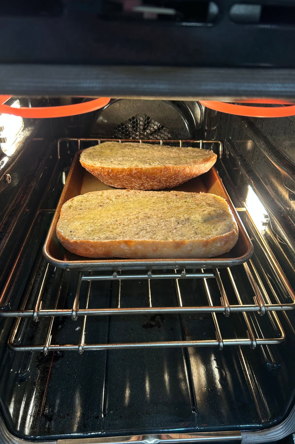 Garlic Bread Spread recipe from RecipeGirl.com garlic bread broiling in oven