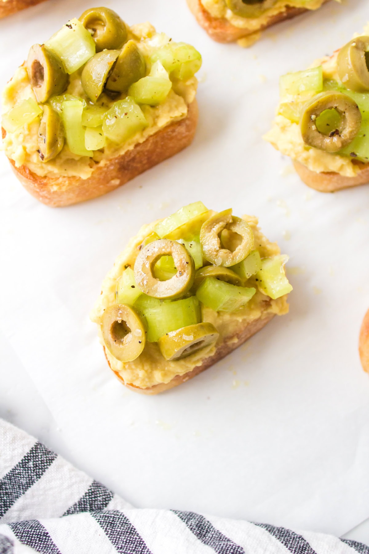 Greek Crostini appetizer recipe from RecipeGirl.com greek crostini close up