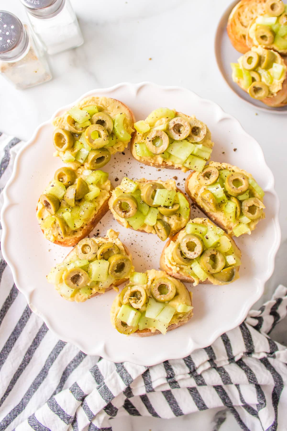 Greek Crostini appetizer recipe from RecipeGirl.com platter of greek crostini