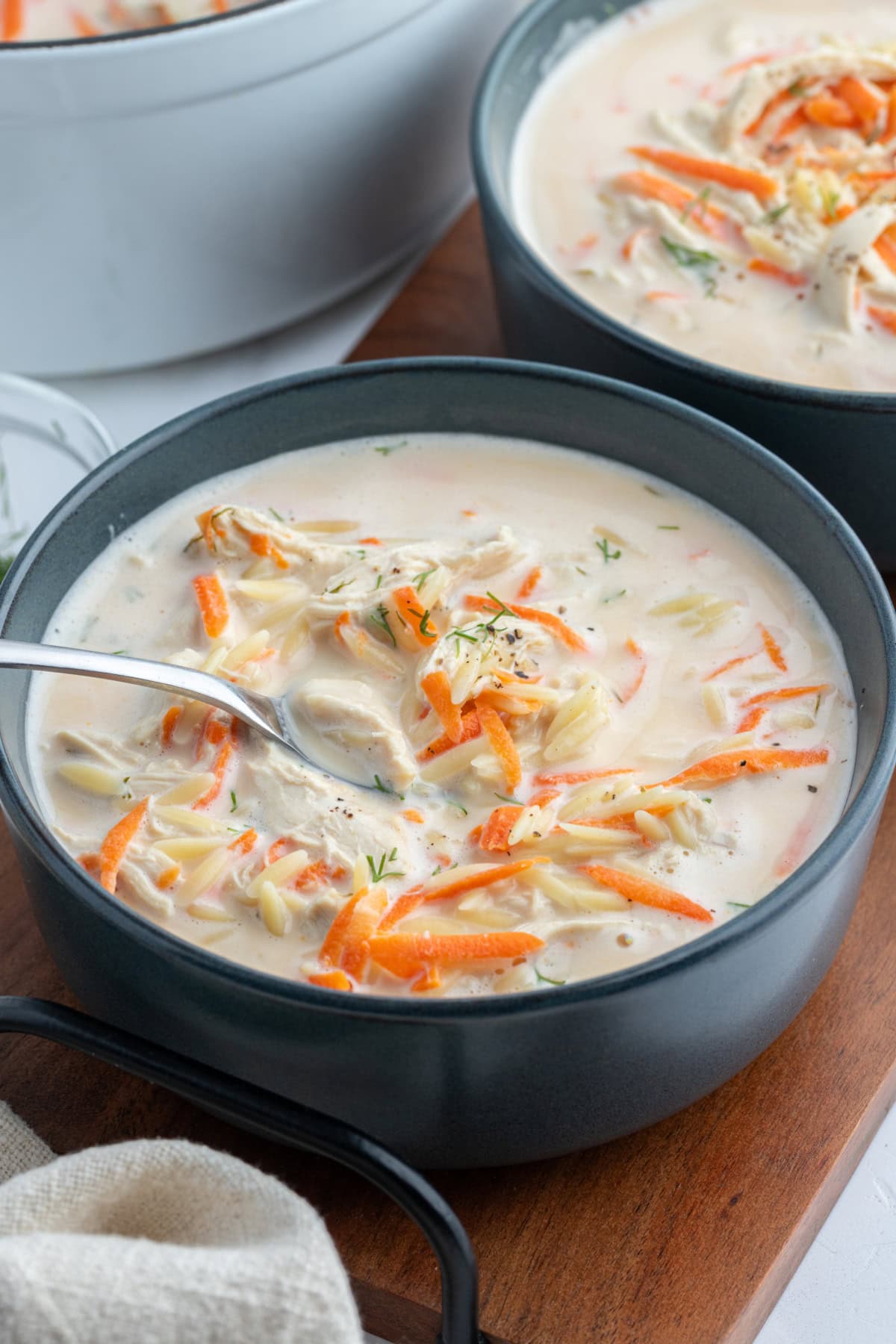 Greek Orzo and Chicken Soup recipe from RecipeGirl.com bowl of greek orzo and chicken soup