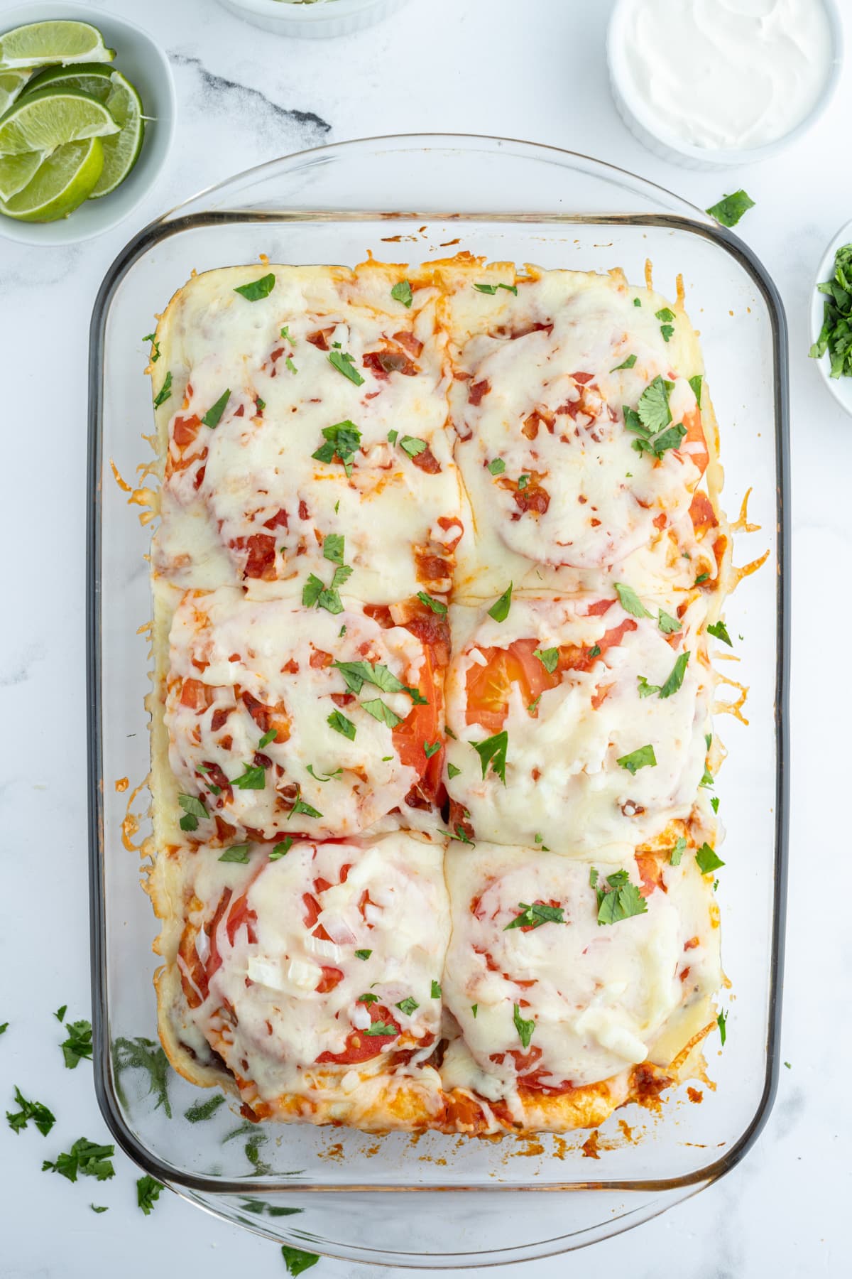 Inside Out Fish Tacos, otherwise known as Fish Taco Casserole recipe from RecipeGirl.com overhead shot of fish taco casserole in baking dish