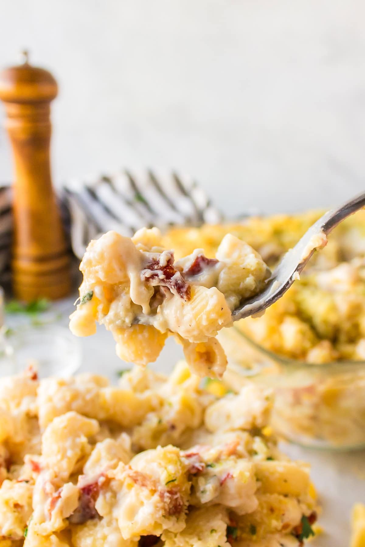 Macaroni and Cheese with Bacon recipe from RecipeGirl.com #macaroni #cheese #macaroniandcheese #bacon #recipe #RecipeGirl spoonful of bacon macaroni and cheese