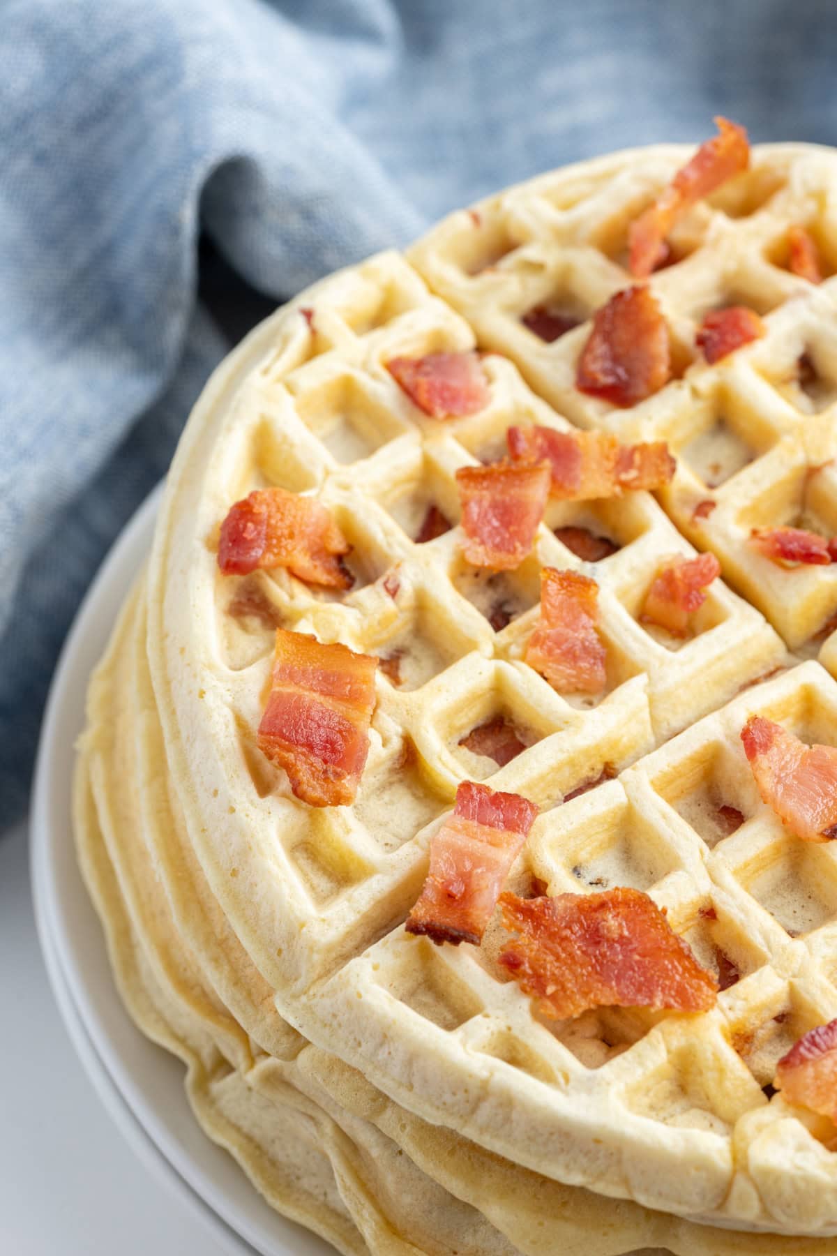 Maple Bacon Waffles recipe from RecipeGirl.com looking down onto maple bacon waffles