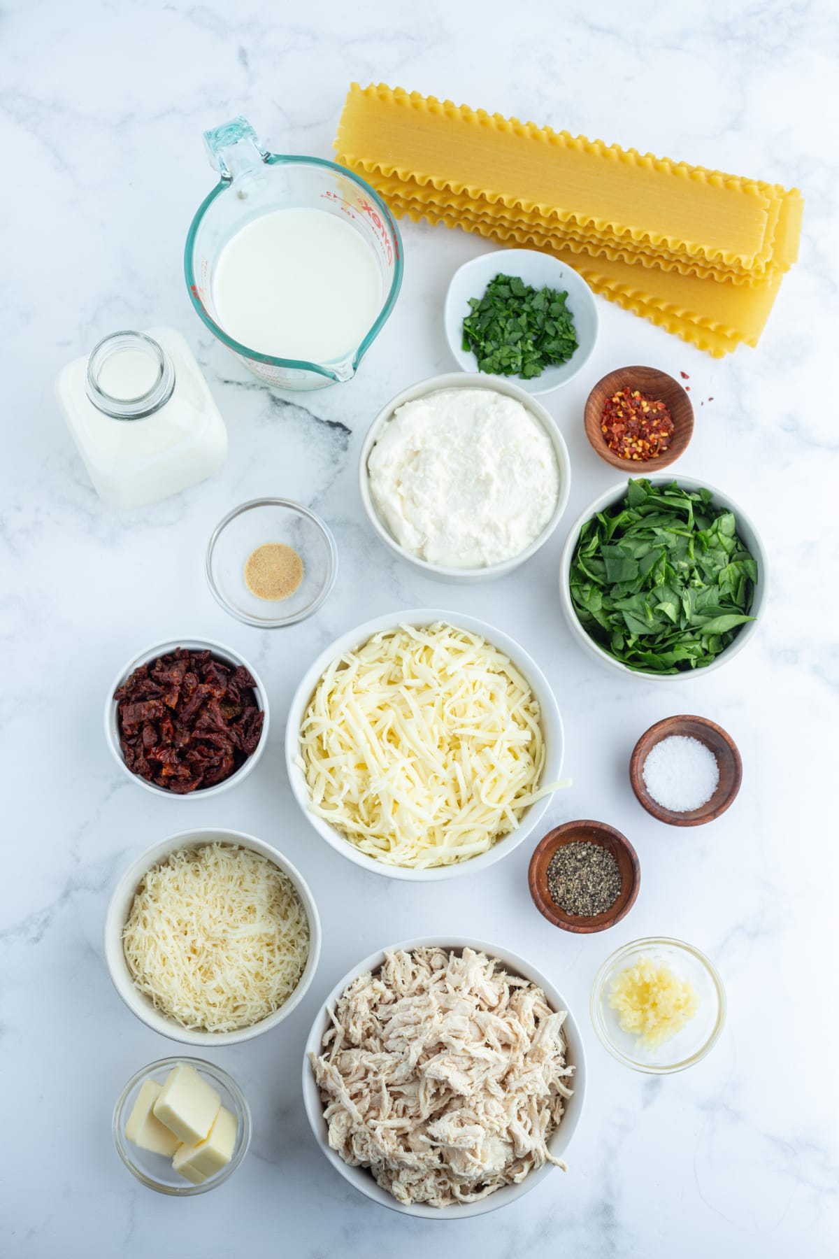 Marry Me Chicken Lasagna recipe from RecipeGirl.com ingredients displayed for making marry me chicken lasagna
