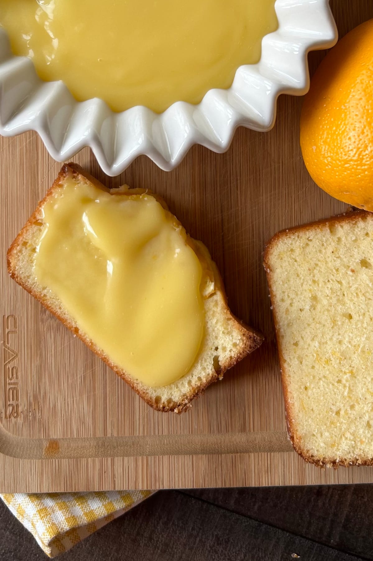 Easy Meyer Lemon Curd recipe from RecipeGirl.com meyer lemon curd on slice of lemon bread