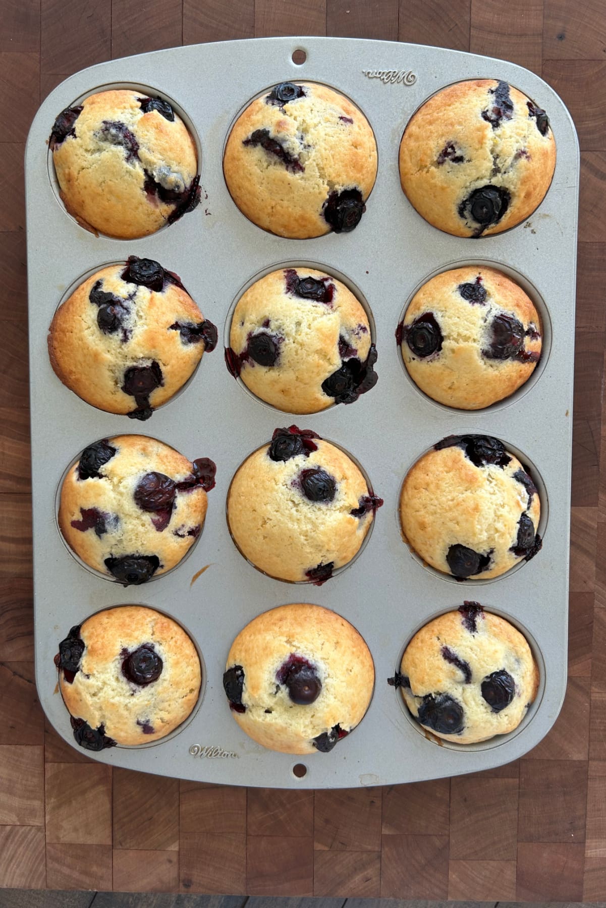 Old Fashioned Blueberry Muffins recipe from RecipeGirl.com old fashioned blueberry muffins in muffin tin