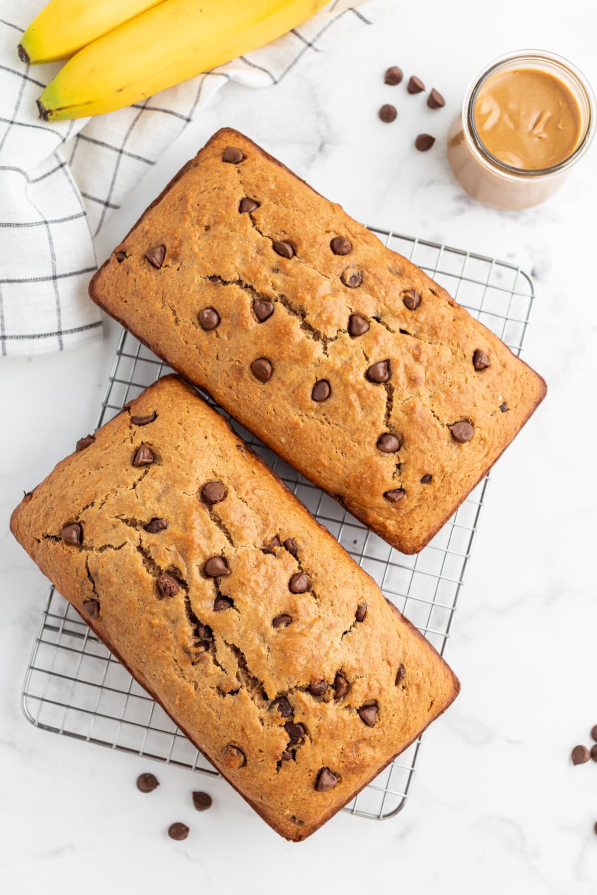 Peanut Butter Chocolate Chip Banana Bread recipe from RecipeGirl.com two loaves of peanut butter chocolate chip banana bread