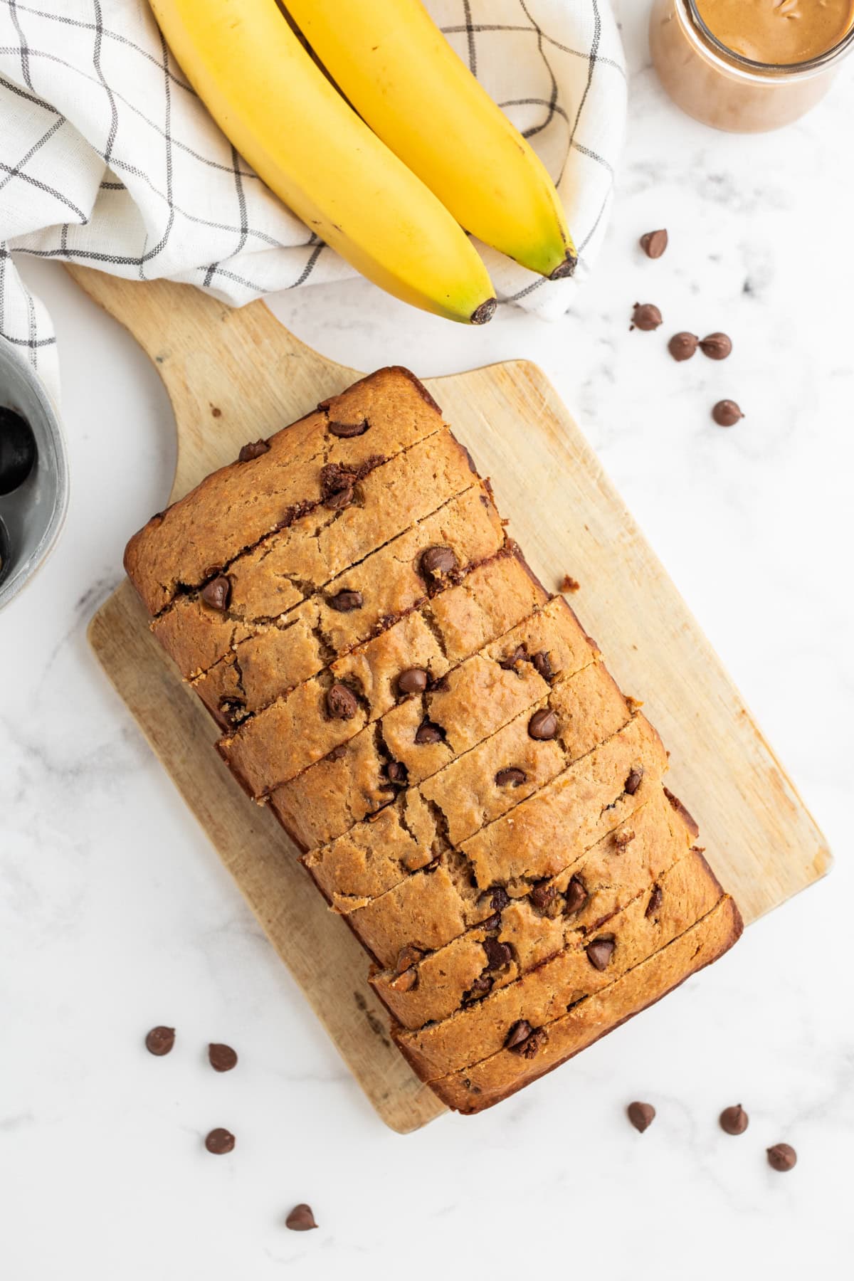 Peanut Butter Chocolate Chip Banana Bread recipe from RecipeGirl.com overhead shot of peanut butter chocolate chip banana bread sliced