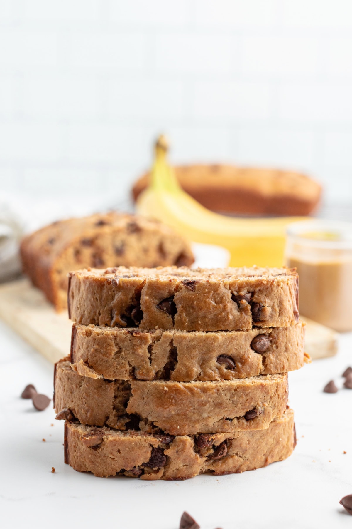 Peanut Butter Chocolate Chip Banana Bread recipe from RecipeGirl.com slices of banana bread stacked