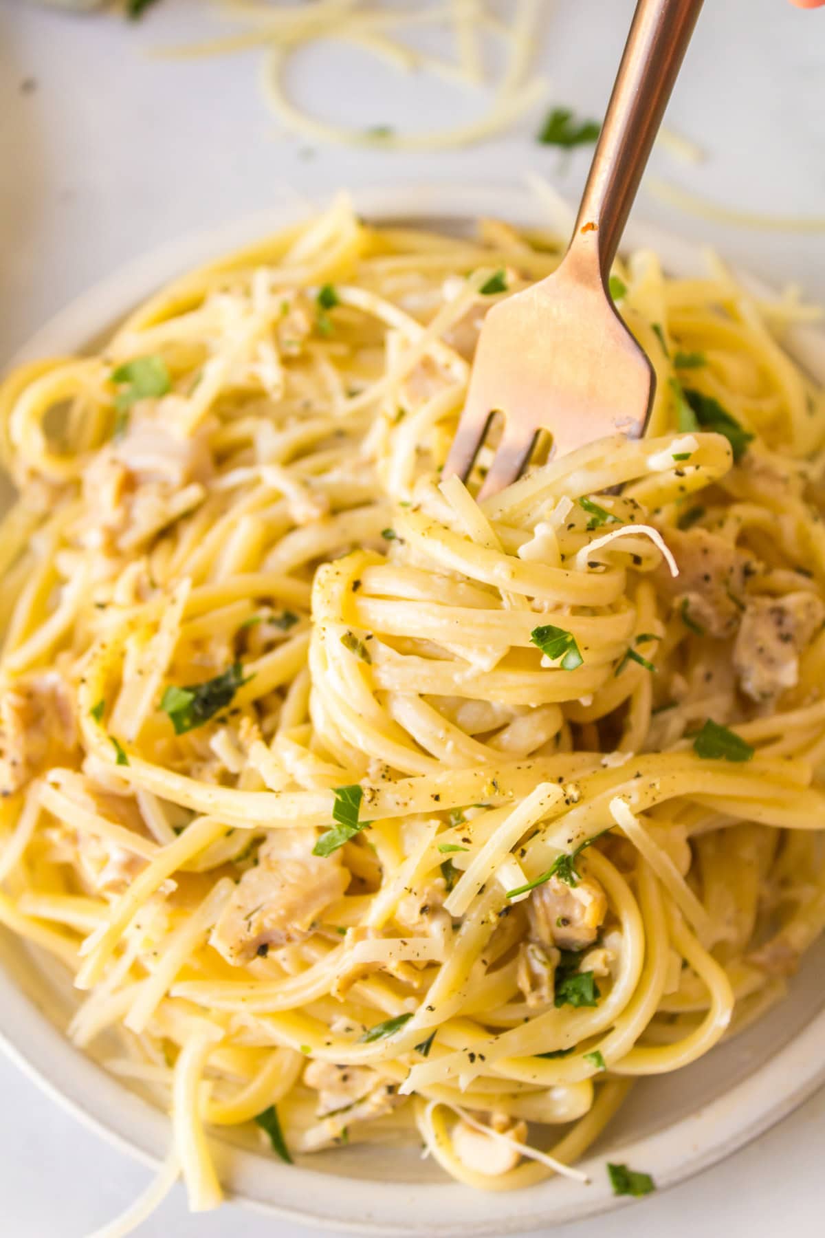 Pioneer Woman's Linguine with Clam Sauce: recipe shared from RecipeGirl.com fork in a bowl of clam linguine