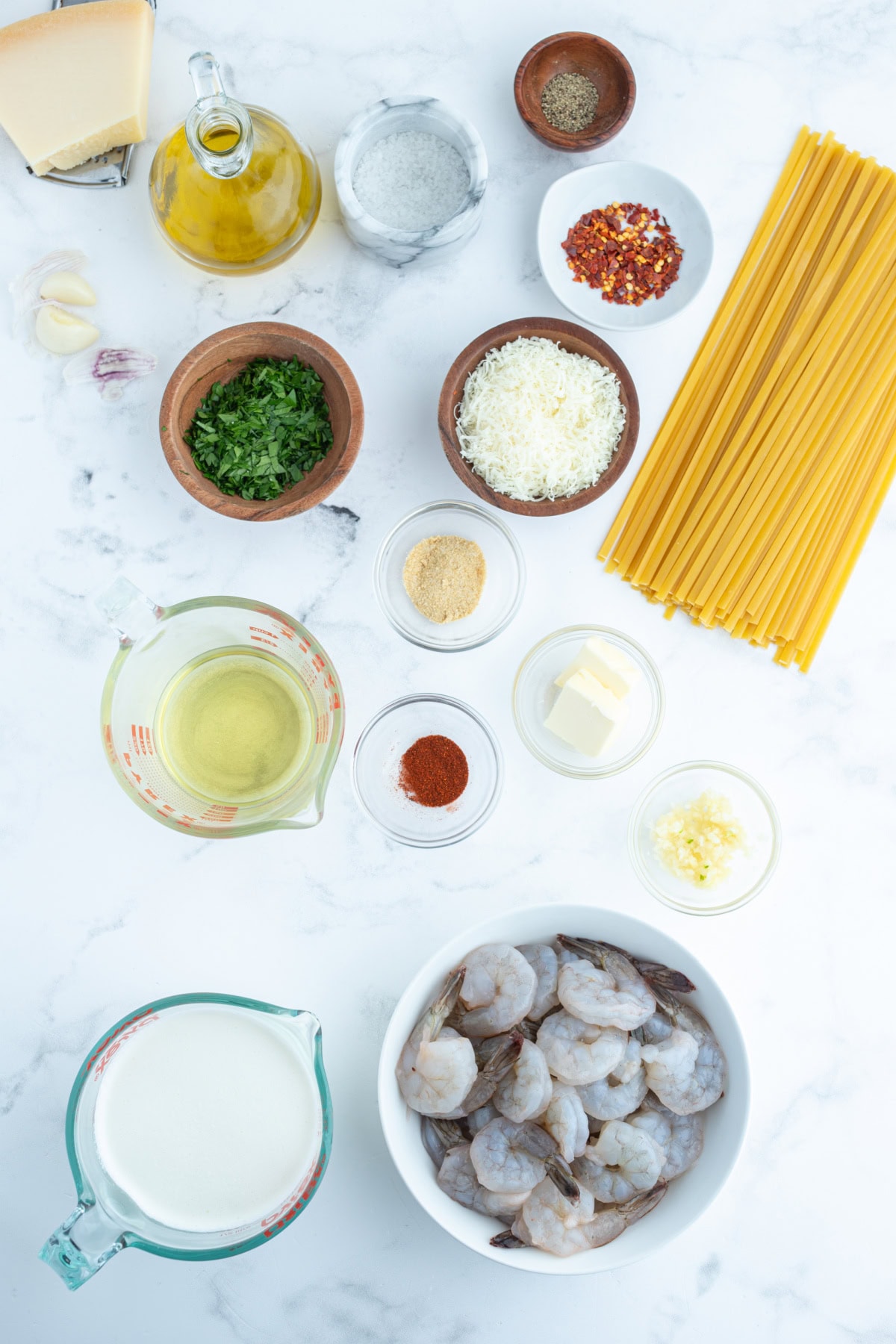 Shrimp Scampi Alfredo recipe from RecipeGirl.com ingredients displayed for making shrimp scampi alfredo