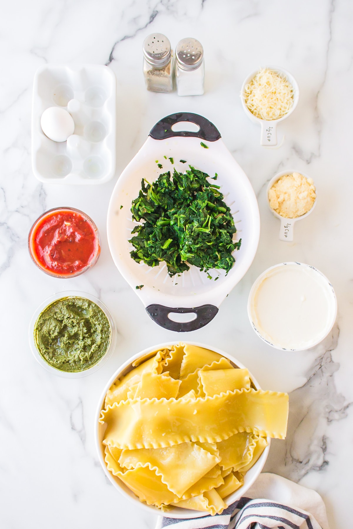 Spinach, Pesto and Cheese Lasagna recipe from RecipeGirl.com ingredients needed for making spinach pesto and cheese lasagna
