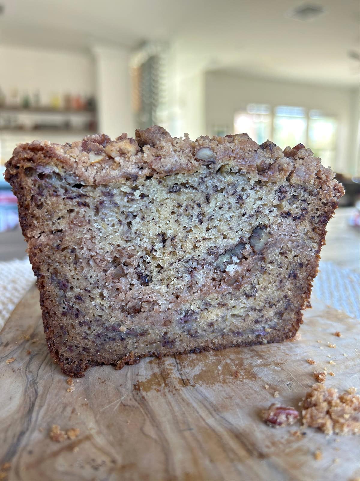 Streusel Banana Bread recipe from RecipeGirl.com banana bread loaf sliced open to see inside