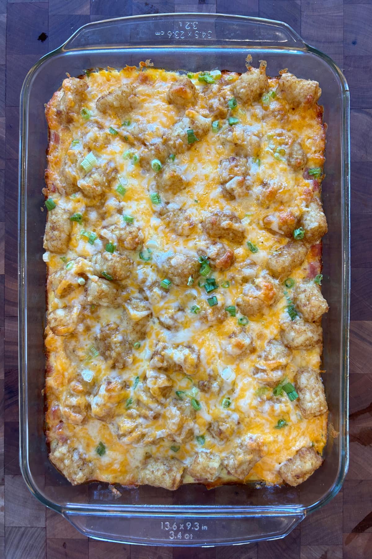 Tater Tot Breakfast Casserole recipe from RecipeGirl.com overhead shot of tater tot breakfast casserole in dish