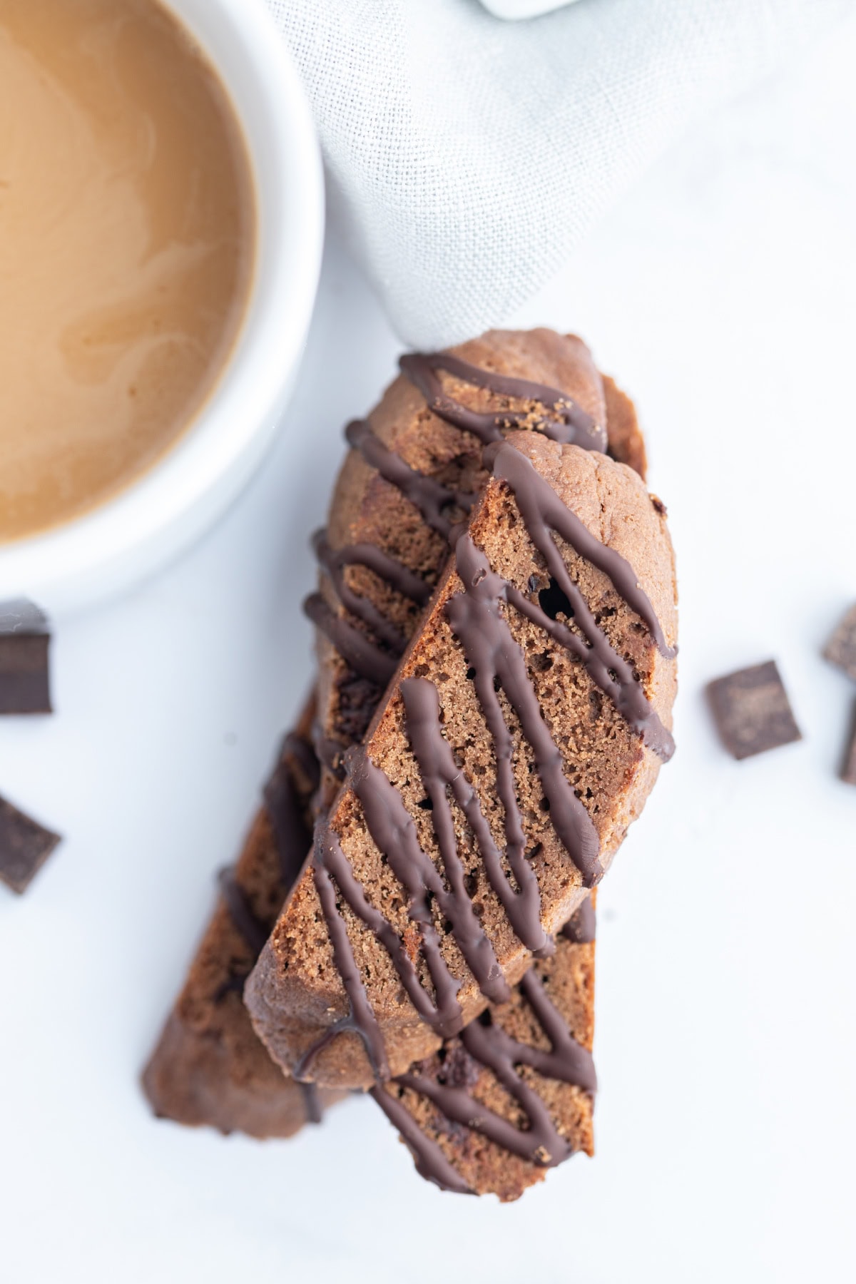 Triple Chocolate Biscotti recipe from RecipeGirl.com close up stacked triple chocolate biscotti