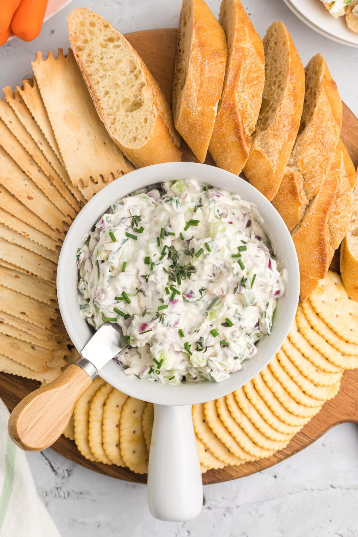 Vegetable Goat Cheese Spread recipe from RecipeGirl.com vegetable goat cheese spread in bowl with crackers